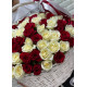 Red and white roses in a basket