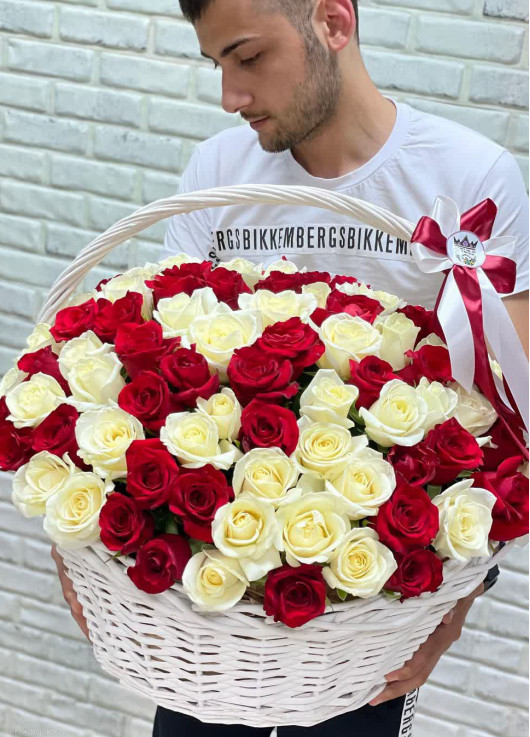 Red and white roses in a basket