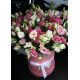 Pink eustoma in a hat box
