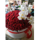 Orchids and roses  in a hat box
