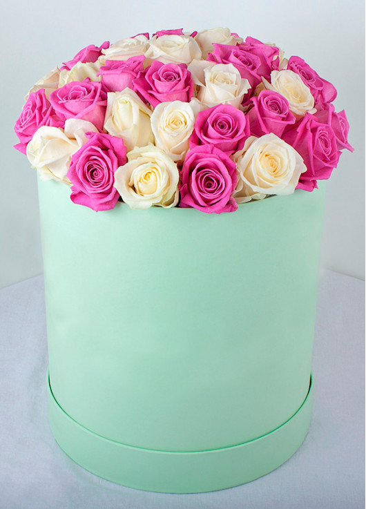 Pink and white roses in a hatbox Dnipro