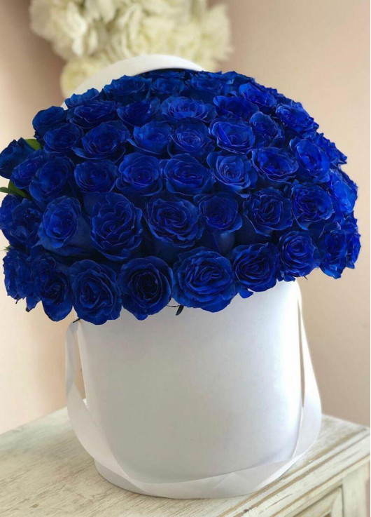 Blue roses in a hatbox