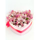Orchids in a hat box heart