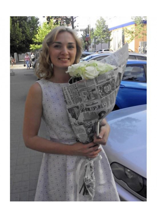 Roses in newspaper