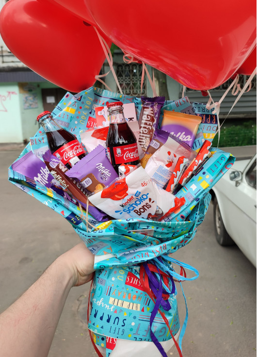 Coca Cola and a bouquet of sweets
