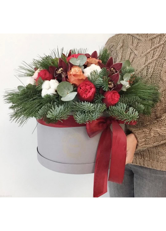 Christmas box with flowers and trees