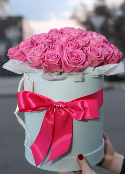 Pink roses in a box