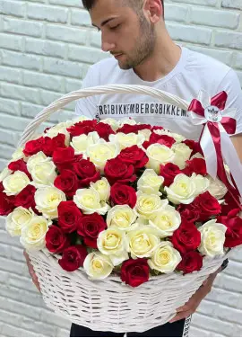 Red and white roses in a basket
