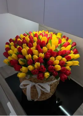 201 mixed tulips in a luxury wicker basket