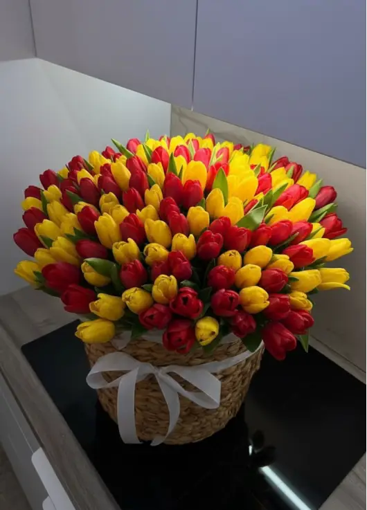 201 mixed tulips in a luxury wicker basket