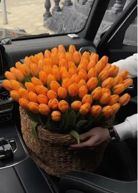 201 orange tulips in a luxury wicker basket