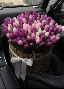 201 soft tulips in a luxury wicker basket