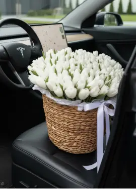 201 white tulips in a luxury wicker basket