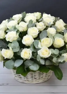 White roses in a basket