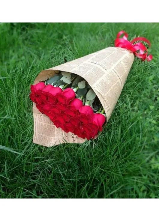 Roses in newspaper