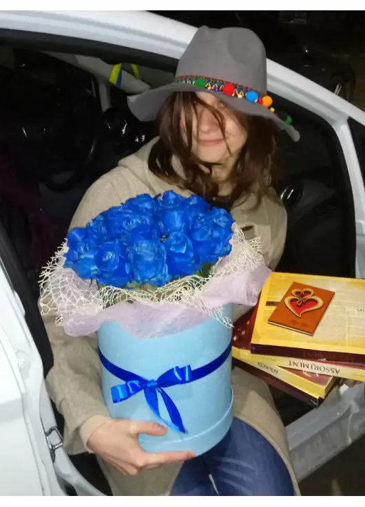 Blue roses in a hatbox