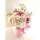 Pink eustoma in a hat box