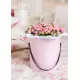 Bush roses in a hatbox