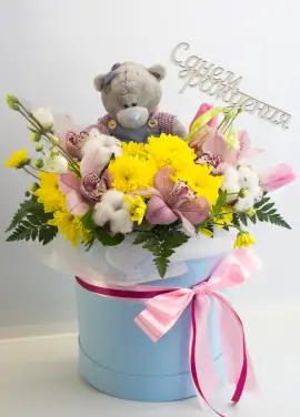 Presents flowers and teddy