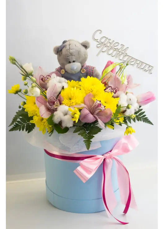 Presents flowers and teddy