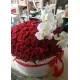 Orchids and roses  in a hat box