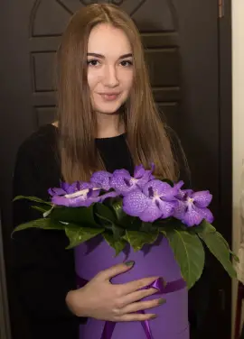 Orchids in a hat box