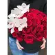 Orchids and roses  in a hat box