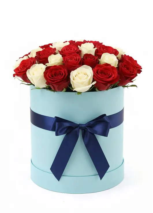 25 red and white roses in a box