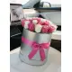 25 white and pink roses in a box