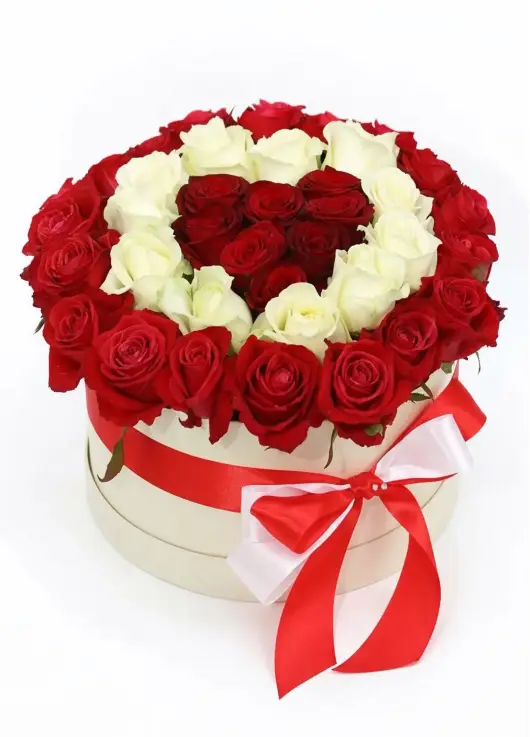 35 red and white roses in a box