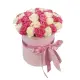 35 white and pink roses in a box