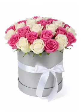 35 white and pink roses in a box