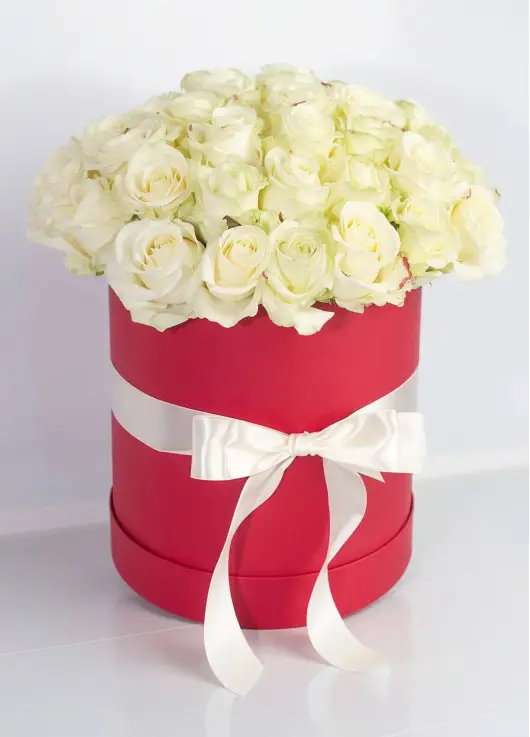 35 white roses in a box