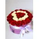 35 red and white roses in a box