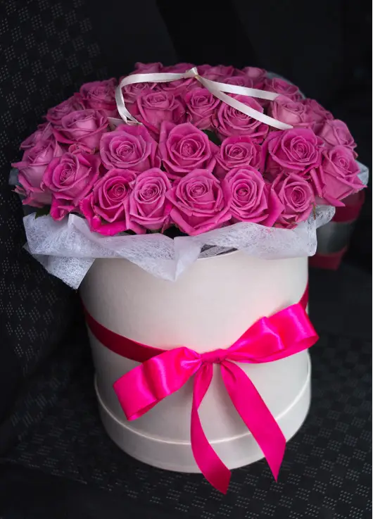 35 pink roses in a box