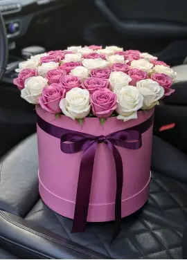 45 white and pink roses in a box