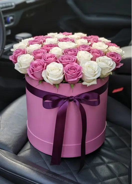 45 white and pink roses in a box