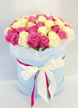 Pink and white roses in a hatbox Dnipro