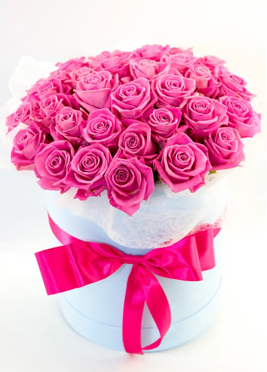 Pink roses in a box