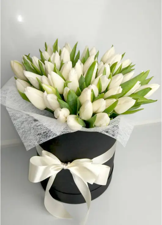White tulips in a hat box White tulips in a hat box