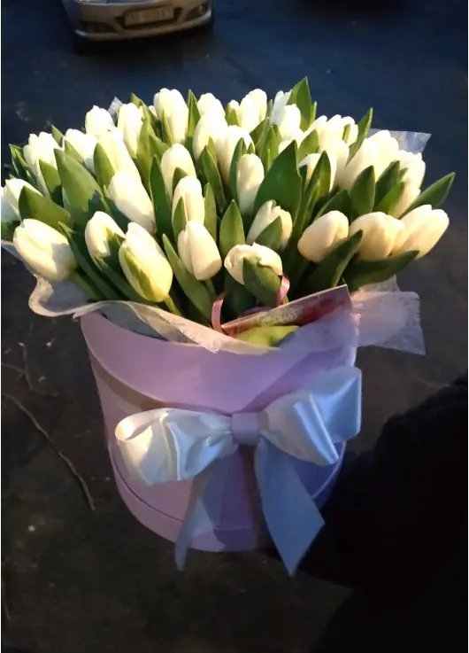 White tulips in a hat box White tulips in a hat box
