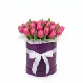 Raspberry tulips in a box
