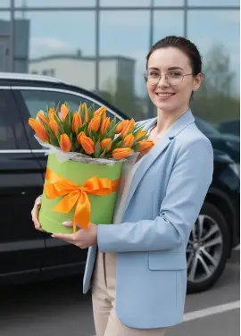 25 orange tulips in a box (imported, Netherlands)