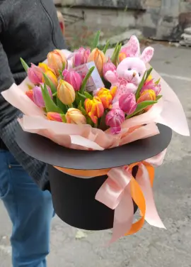 Magician hat with bunny and tulips