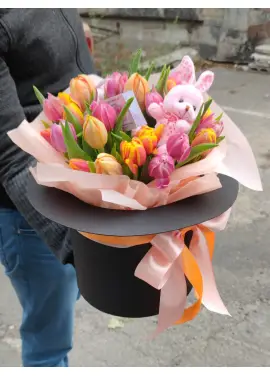Magician hat with bunny and tulips