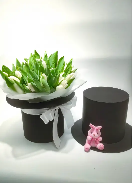 Magician hat with bunny and tulips Magician hat with bunny and tulips