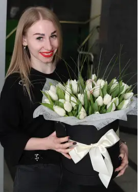 White tulips in a hat box