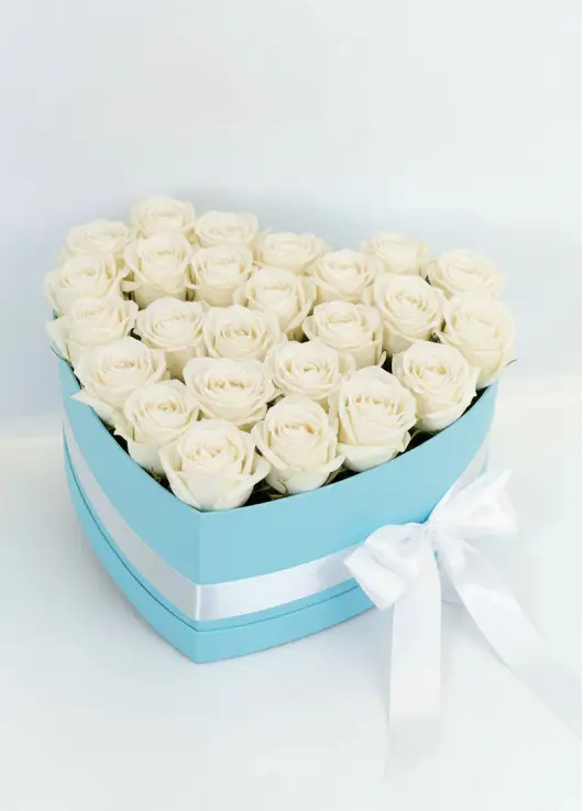 25 white roses in a heart box