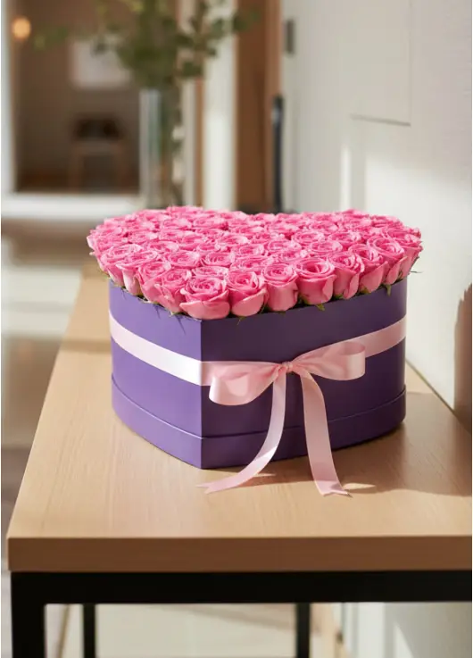 75 pink roses in a heart box