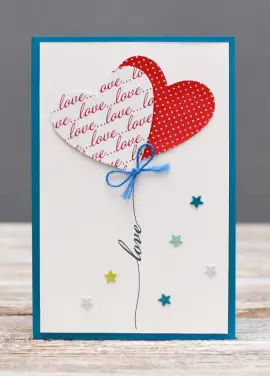 Postcard "Love you" heart-shaped balls on a postcard
